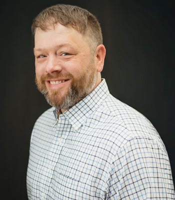 Portrait of Josh Dayton, Realtor®.